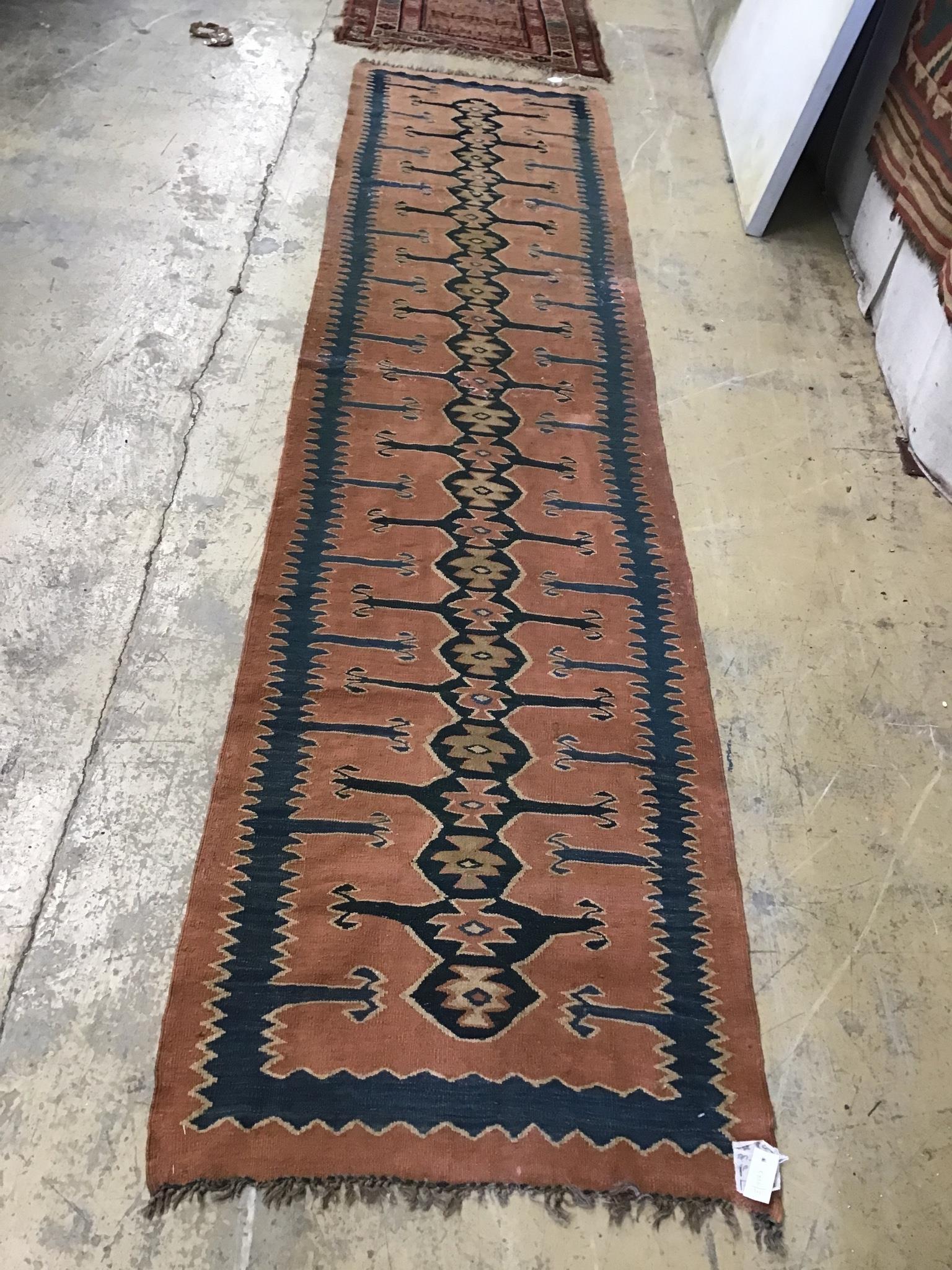 An Afghan Kelim runner, 380 x 88cm